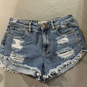 Distressed denim shorts